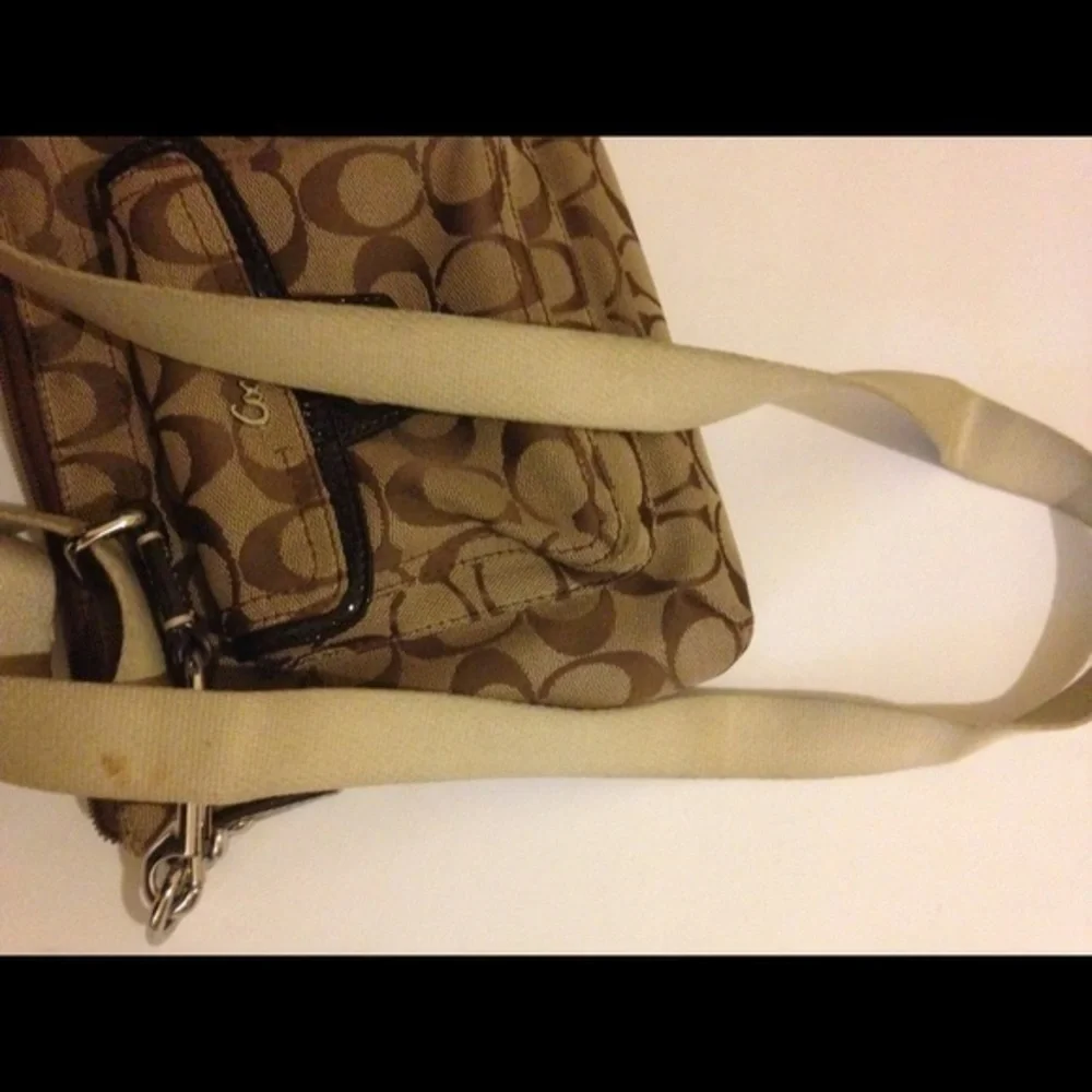 COACH signature c brown crossbody turnlock bag